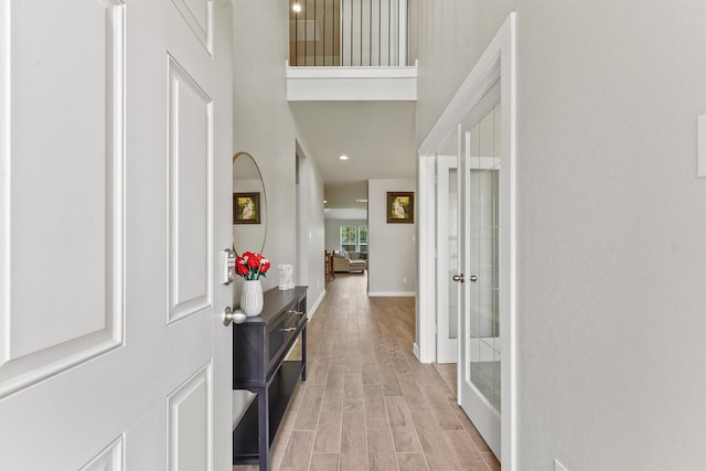 2231 Bright Sunrise Trl, Fresno, TX 77545 - foyer featuring a high ceiling and light wood-type flooring
