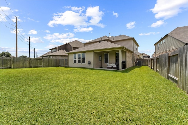 2231 Bright Sunrise Trl, Fresno, TX 77545 - back of house with a fenced backyard, a patio, and a shingled roof