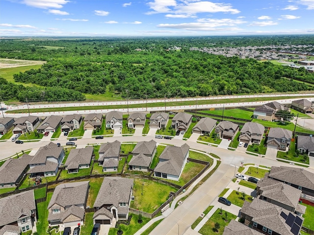 2231 Bright Sunrise Trl, Fresno, TX 77545 - aerial perspective of suburban area featuring a heavily wooded area