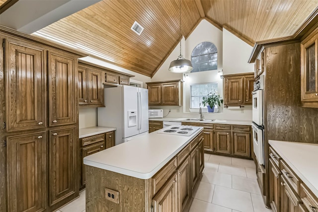 3914 Cherry Forest Dr, Houston, TX 77088 - kitchen with white appliances, wood ceiling, a kitchen island, light countertops, and high vaulted ceiling