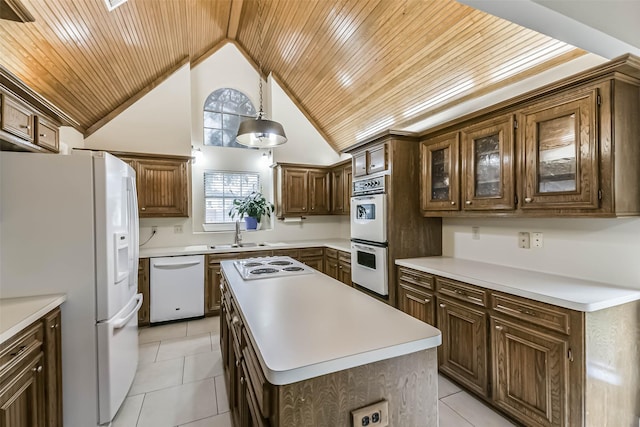 3914 Cherry Forest Dr, Houston, TX 77088 - kitchen featuring white appliances, wooden ceiling, light tile patterned floors, a center island, and light countertops
