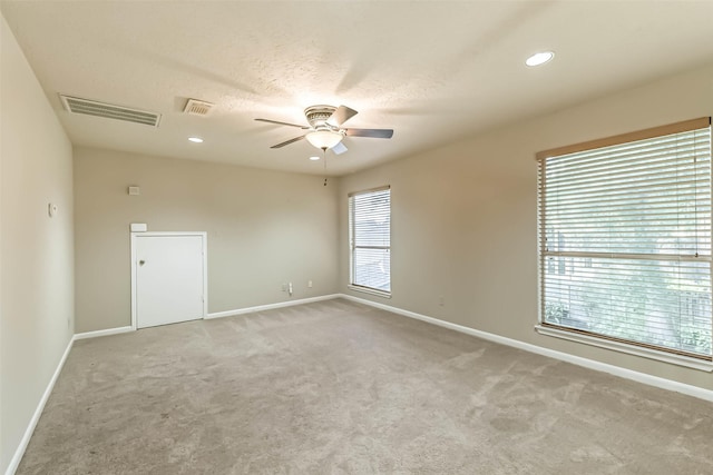 3914 Cherry Forest Dr, Houston, TX 77088 - spare room featuring a ceiling fan, carpet, and recessed lighting