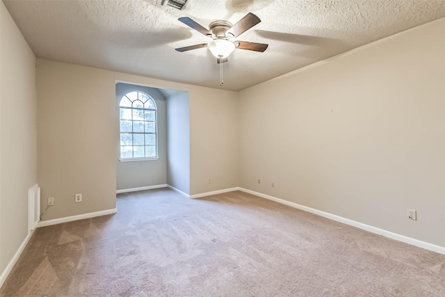3914 Cherry Forest Dr, Houston, TX 77088 - spare room with a textured ceiling, carpet, and ceiling fan