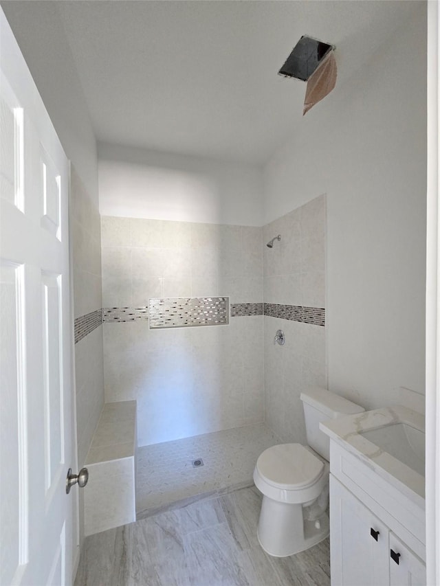 14387 Half Circle St, Splendora, TX 77372 - bathroom with tiled shower and vanity