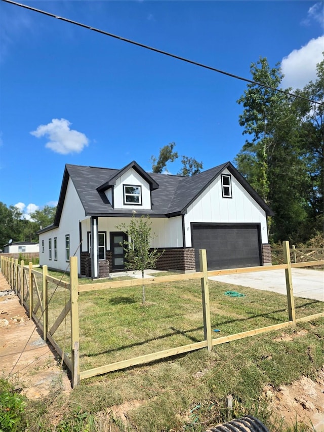 14387 Half Circle St, Splendora, TX 77372 - modern inspired farmhouse with driveway and brick siding