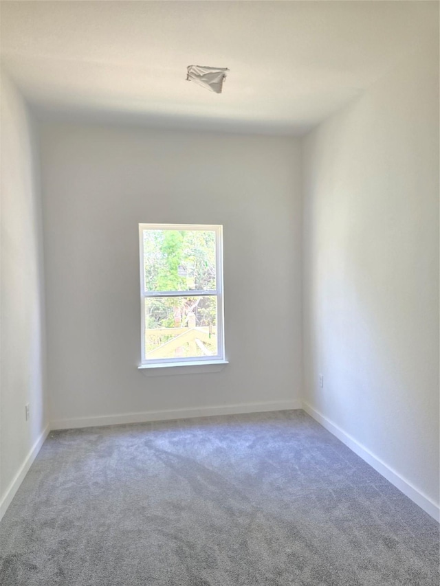 14387 Half Circle St, Splendora, TX 77372 - carpeted empty room with baseboards