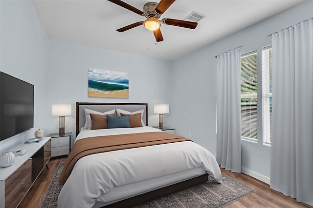 8215 Canyon St, Houston, TX 77051 - bedroom with wood finished floors and ceiling fan
