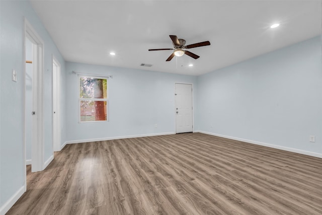 8215 Canyon St, Houston, TX 77051 - unfurnished bedroom with wood finished floors, recessed lighting, and ceiling fan