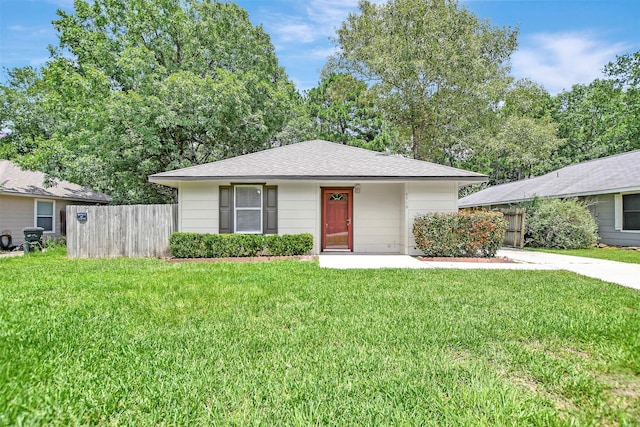 8910 E Buffalo Cir, Willis, TX 77378 - view of front of property with roof with shingles