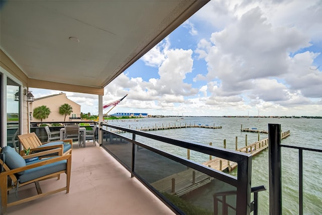 3663 Nasa Pkwy Unit 301, Seabrook, TX 77586 - balcony with a water view and a dock