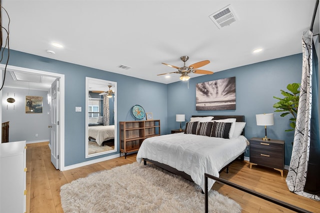 3663 Nasa Pkwy Unit 301, Seabrook, TX 77586 - bedroom with attic access, hardwood / wood-style flooring, ceiling fan, and recessed lighting