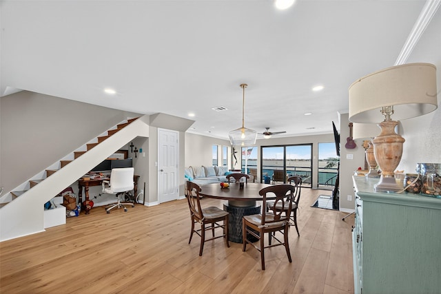 3663 Nasa Pkwy Unit 301, Seabrook, TX 77586 - dining room featuring light wood-style floors, stairs, a ceiling fan, and recessed lighting