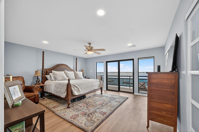 3663 Nasa Pkwy Unit 301, Seabrook, TX 77586 - bedroom featuring access to exterior, light wood-style floors, recessed lighting, and ceiling fan
