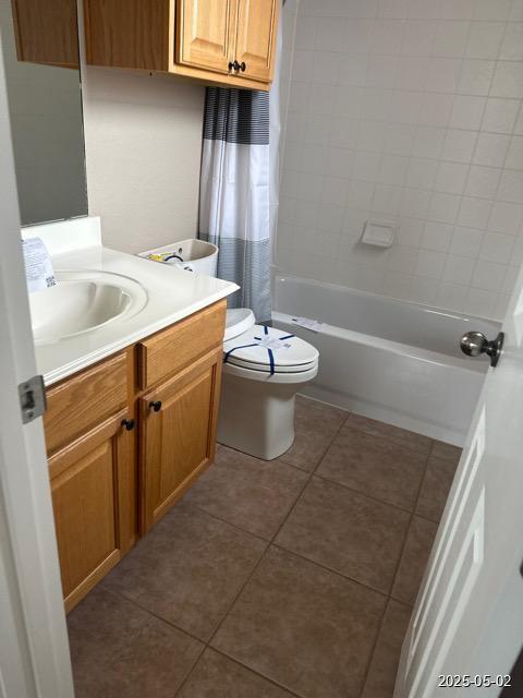1715 Palmer Vw, San Antonio, TX 78260 - full bathroom featuring vanity, tile patterned flooring, and shower / bathtub combination with curtain