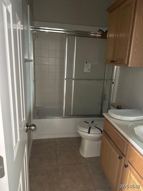 1715 Palmer Vw, San Antonio, TX 78260 - bathroom featuring tile patterned flooring, shower / bath combination with glass door, and double vanity