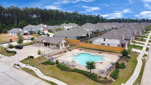 2832 Madison Dr, Conroe, TX 77304 - community pool with a residential view
