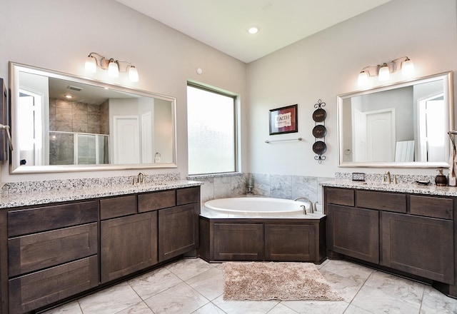 2510 Serene Path, Missouri City, TX 77459 - bathroom featuring a shower stall, two vanities, a bath, and marble finish floors