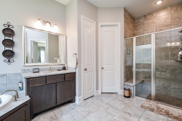 2510 Serene Path, Missouri City, TX 77459 - full bath featuring a shower stall, marble finish flooring, vanity, a tub, and recessed lighting