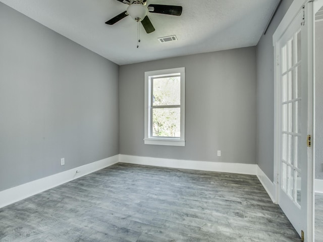 810-812 Maltby St Unit 6, Houston, TX 77011 - empty room with wood finished floors and ceiling fan