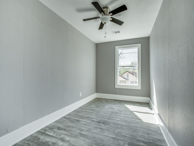 810-812 Maltby St Unit 6, Houston, TX 77011 - empty room featuring ceiling fan, a textured wall, and wood finished floors