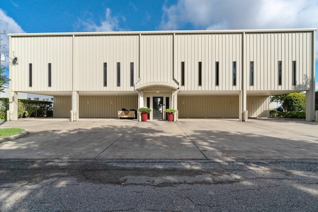 7810 Eagle Ln, Spring, TX 77379 - view of building exterior with driveway and a carport
