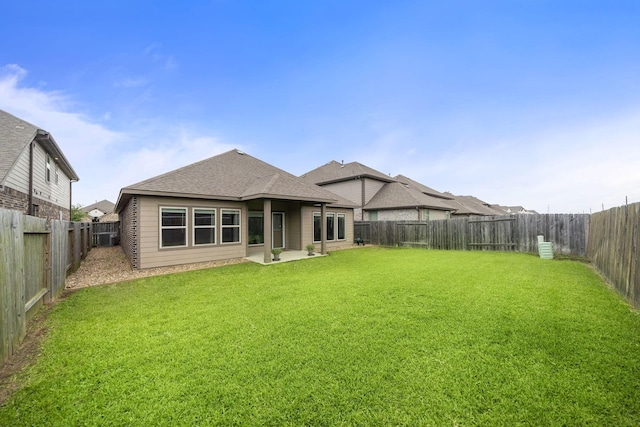 5442 Atwood Canyon Ct, Richmond, TX 77407 - back of property featuring a fenced backyard and roof with shingles