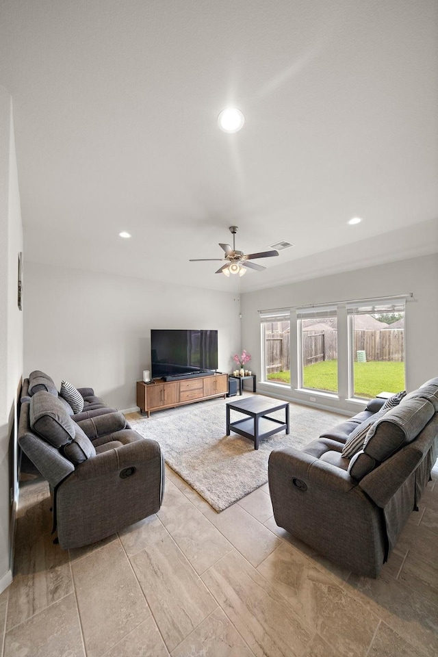 5442 Atwood Canyon Ct, Richmond, TX 77407 - living room with ceiling fan and recessed lighting