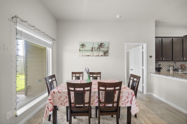 5442 Atwood Canyon Ct, Richmond, TX 77407 - dining room featuring baseboards and concrete floors