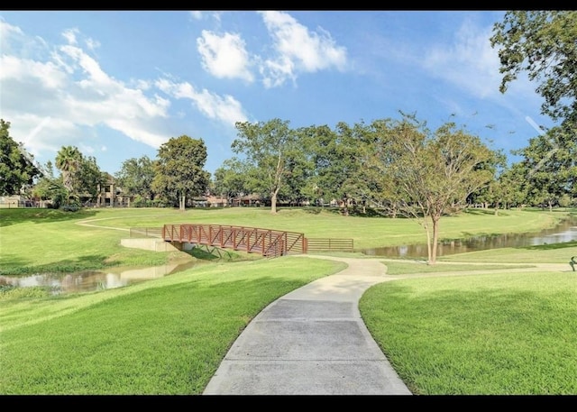 5442 Atwood Canyon Ct, Richmond, TX 77407 - view of home's community with a water view and a yard