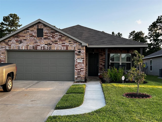 278 Cumberland Forest Dr, Magnolia, TX 77354 - view of front facade featuring roof with shingles, brick siding, a front lawn, and concrete driveway
