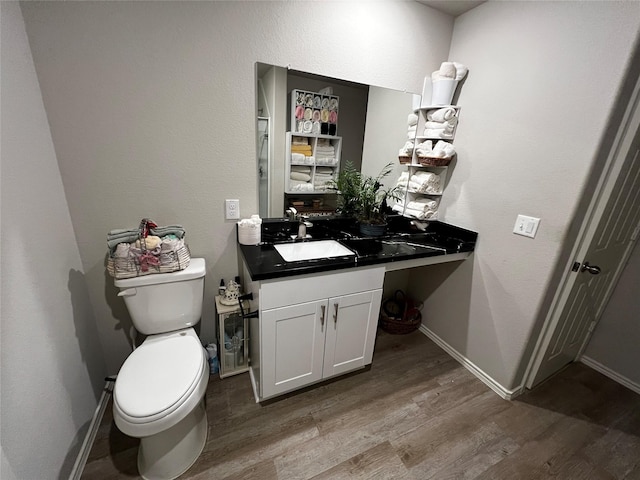 278 Cumberland Forest Dr, Magnolia, TX 77354 - bathroom with wood finished floors and vanity