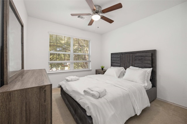 5767 Wandering Creek Dr, Richmond, TX 77469 - carpeted bedroom featuring ceiling fan