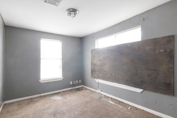7973 Ritz St, Houston, TX 77028 - spare room with carpet flooring and baseboards