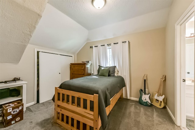 6402 Saint Jude Dr, Pasadena, TX 77505 - bedroom with carpet floors, vaulted ceiling, a textured ceiling, and a closet