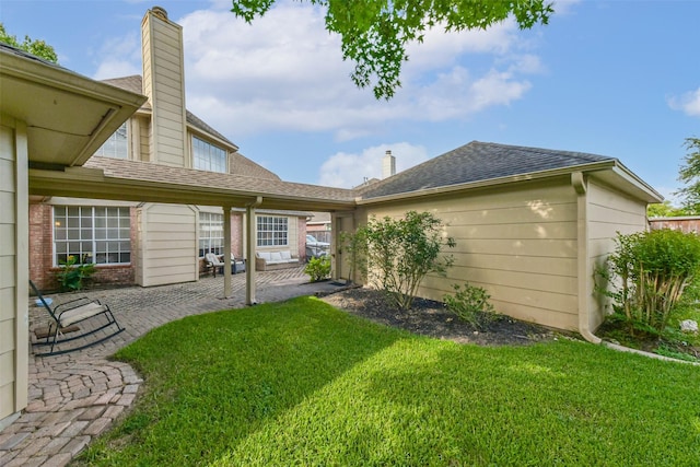 6402 Saint Jude Dr, Pasadena, TX 77505 - view of green lawn featuring a patio area