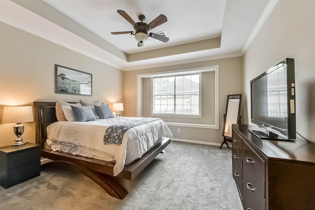 6402 Saint Jude Dr, Pasadena, TX 77505 - bedroom featuring light colored carpet, ornamental molding, a raised ceiling, and ceiling fan