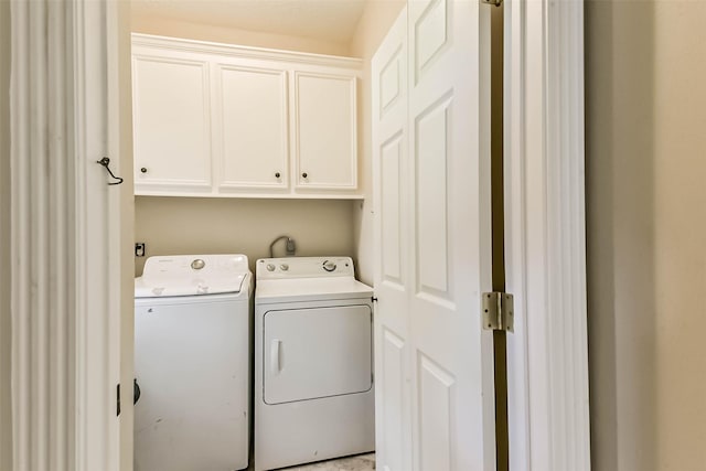 6402 Saint Jude Dr, Pasadena, TX 77505 - laundry room featuring washer and clothes dryer and cabinet space