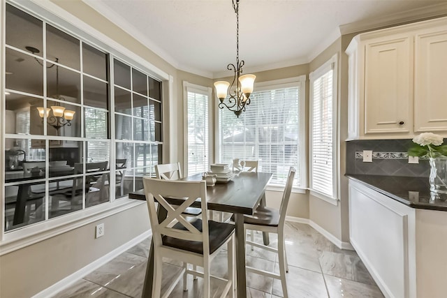 6402 Saint Jude Dr, Pasadena, TX 77505 - dining space featuring a chandelier, ornamental molding, and light marble finish flooring