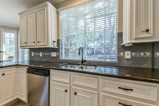 6402 Saint Jude Dr, Pasadena, TX 77505 - kitchen with dishwasher, backsplash, and white cabinets