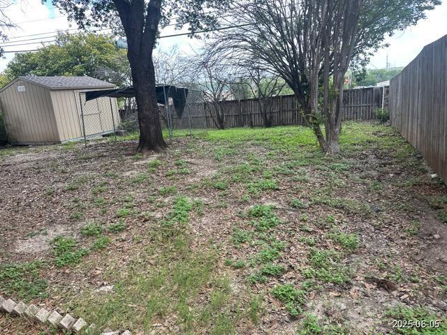 7306 Ellerby Pt, San Antonio, TX 78240 - fenced backyard with a storage shed