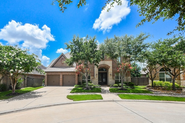2710 Indigo Manor Ln, Katy, TX 77494 - view of front of property featuring brick siding, driveway, and an attached garage