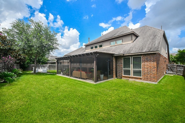 2710 Indigo Manor Ln, Katy, TX 77494 - back of property featuring a sunroom, brick siding, a fenced backyard, and a shingled roof