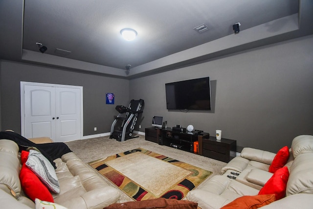 2710 Indigo Manor Ln, Katy, TX 77494 - carpeted living area with a tray ceiling and baseboards
