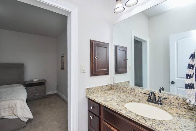 2710 Indigo Manor Ln, Katy, TX 77494 - bathroom with vanity and baseboards