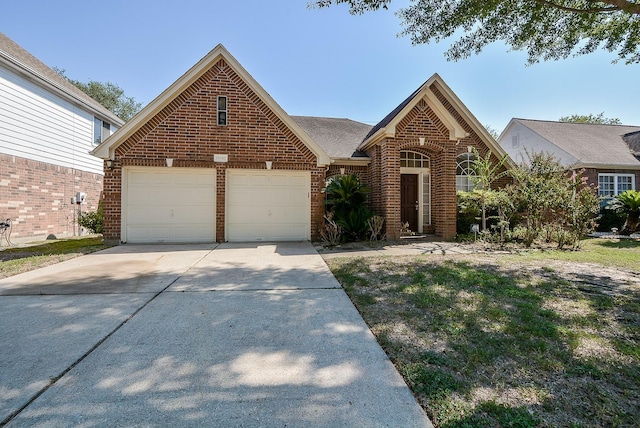 16902 Valley Palms Dr, Spring, TX 77379 - traditional-style home with brick siding, driveway, and a garage