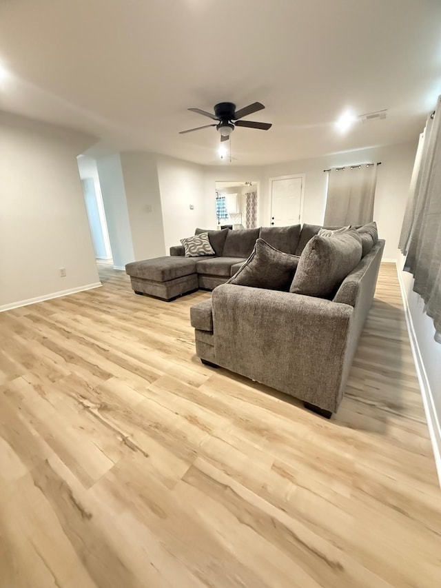 20918 Southhook Ct, Houston, TX 77073 - living area featuring light wood-type flooring and a ceiling fan