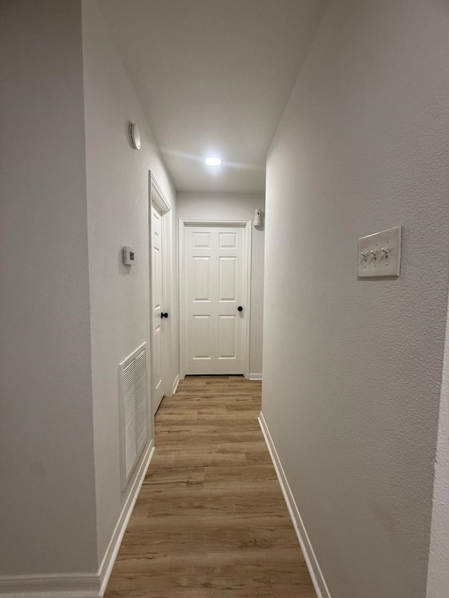 20918 Southhook Ct, Houston, TX 77073 - hall featuring light wood-style floors and baseboards