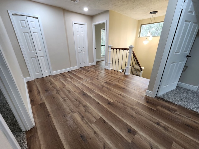 3407 Sandy Forks Dr, Houston, TX 77339 - empty room with dark wood-style flooring and baseboards