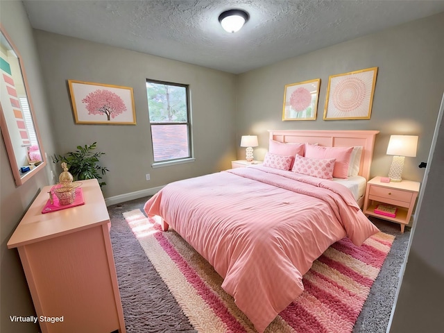 3407 Sandy Forks Dr, Houston, TX 77339 - bedroom featuring carpet floors and a textured ceiling