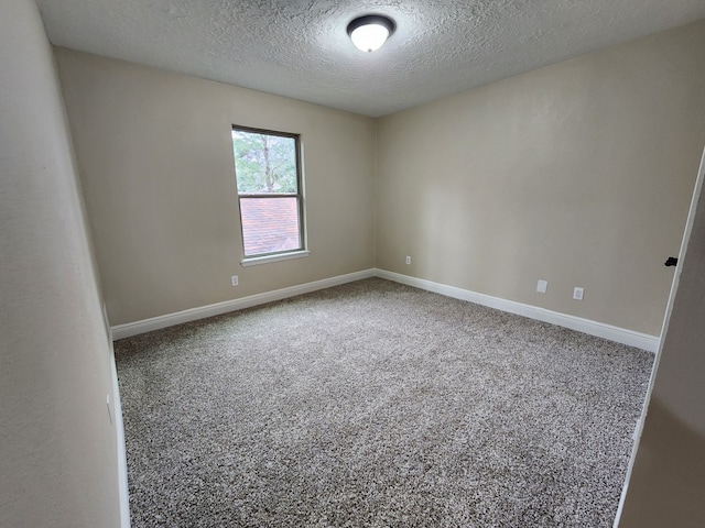 3407 Sandy Forks Dr, Houston, TX 77339 - carpeted spare room with a textured ceiling and baseboards